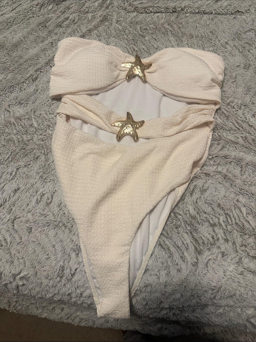 Cream One-Piece Swimsuit with Gold Star Accents